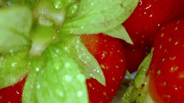 Macro image of fresh strawberries. Concept of healthy vegan food. Strawberry close-up.