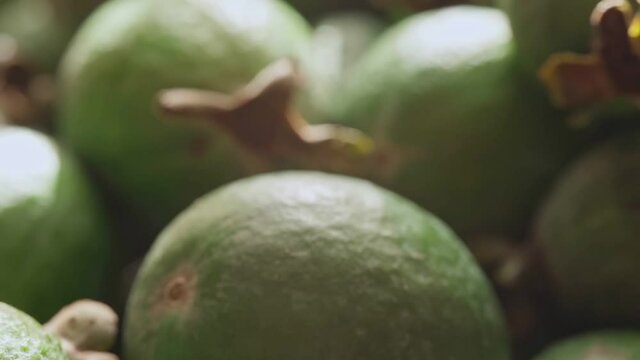 Ripe feijoa fruits on a tray