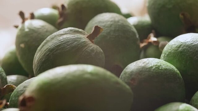 Ripe feijoa fruits on a tray