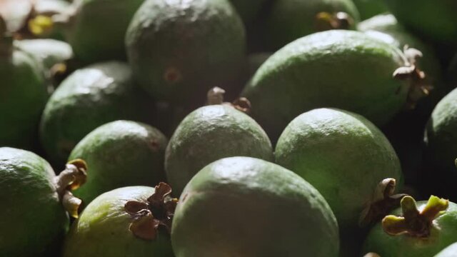 Ripe feijoa fruits on a tray