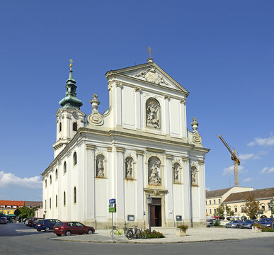 Bruck an der Leitha - Main square with parish church. Bruck an der Leitha (Bridge upon Leitha river) it is an ancient walled city, located in Lower Austria.