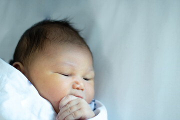 New Girl Has Her Hands in Her Mouth Because She Is Hungry