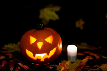 Halloween Still Life Colorful Theme Scary Decorated Dark and yellow maple leaves Room with Burning Pumpkin, Candlestick