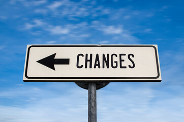 Changes road sign, arrow on blue sky background. One way blank road sign with copy space. Arrow on a pole pointing in one direction. Search for changes.