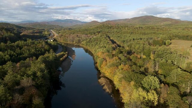 River in Picturesque Nature Landscape in the New England Forest Wilderness - Rising Aerial Drone view