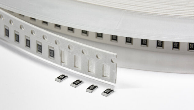 Close-up of tape with surface mount electronics components - resistors