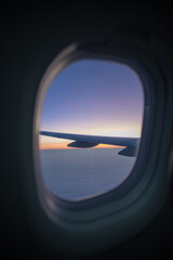 view out of an airplane window, beautiful sunset