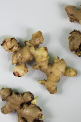 Jahe or Ginger roots one of spices use as cooking spices and herbal drink in Indonesia, Copy space on  isolated white background