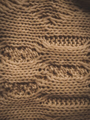 
knitted scarf, top view. autumn and winter background