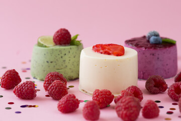 delicious cupcakes or mini cheese cake decorated with happy birthday theme