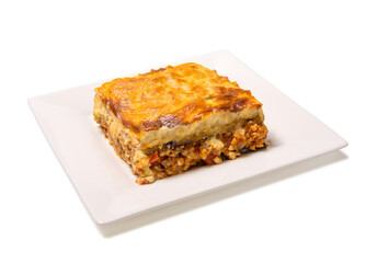 Greek Moussaka close up on a square plate isolated on white background.