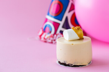 delicious cupcakes or mini cheese cake decorated with happy birthday theme