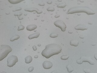 Fototapeta na wymiar water drops on metal texture