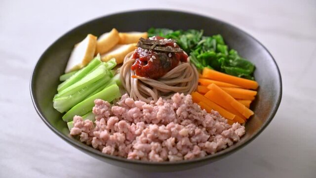Korean spicy cold noodles - bibim makguksu or bibim guksu - Korean food style