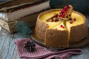 Homemade cheesecake with Christmas spices. Delicious cheese cake with berries, healthy organic summer dessert pie.