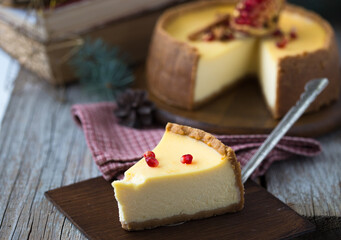 Homemade cheesecake with Christmas spices. Delicious cheese cake with berries, healthy organic summer dessert pie.