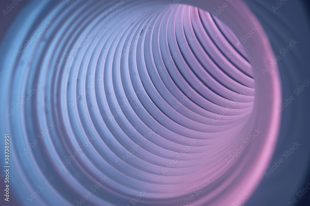 Poster Beautiful round abstract gray tunnel with color light on a background pattern textured ford design.
