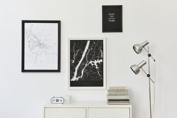 Modern concept of two mock up poster maps with white commode, decoration, book and elegant personal...