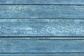 Old blue painted board with natural patterns