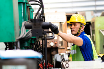 Man Worker at industrial factory wearing uniform and hard hats. Engineering and architecture concept