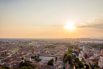 Naklejka premium Skyline of Brescia from the Castle at the sunset. Roman ancient castle. Lombardy region of Italy.