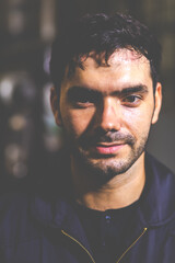 Portrait of confident engineering architect builder wearing protective hardhat working at Metal lathe industrial manufacturing factory. Engineer Operating  lathe Machinery