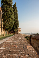 Close up. Medieval castle (Castello di Brescia) with battlements, a tower, drawbridge and ramparts. Lombardy, Italy
