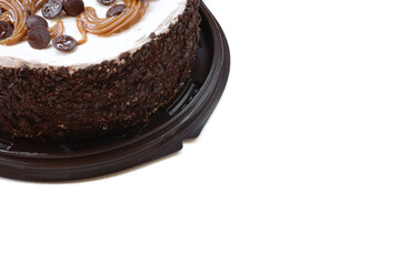 Chocolate cake on the white background brown with space for text.  A mini colorful birthday cake, isolated on a white background, copy space, select