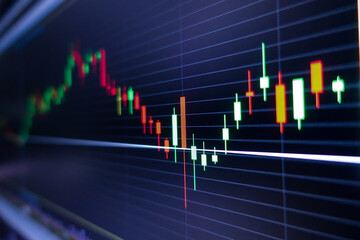 Stock exchange market graph on screen monitor. Economic and financial concept.