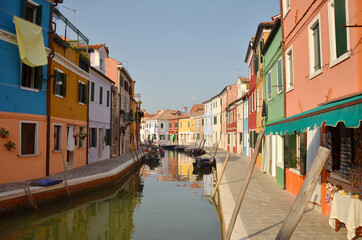 Fototapeta na wymiar Burano is an island in the Venetian Lagoon, northern Italy, near Torcello at the northern end of the lagoon, known for its lace work and brightly coloured homes.