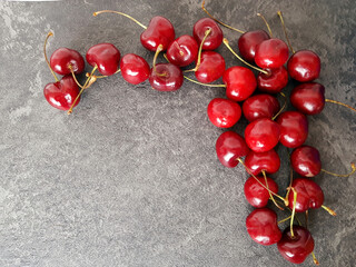 Cherry mature on grey background