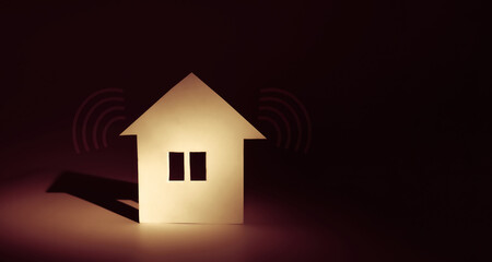 Obraz na płótnie Canvas smart home wireless network. wifi with the house symbol background. internet of things concept.