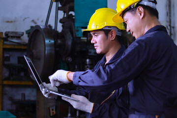 Young asian man Help each other check Machine working system