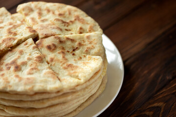 Khachapuri. Georgian traditional dish made from sulguni cheese and bread. Selective focus