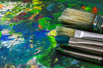 Painter Palette With Colours and brushes