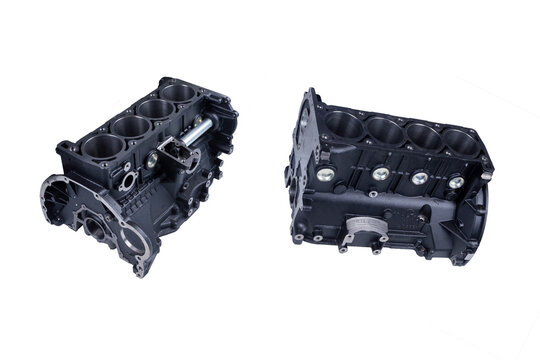 set of two internal combustion engine cylinder heads, black, isolated on a white background