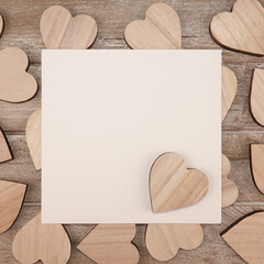 Wooden hearts symbols of love text frame background