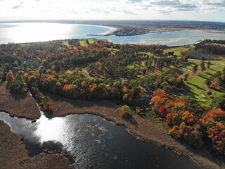 Aerial view of colorful autumn foliage over the Scarborough Beach State Park near Portland, Maine,...