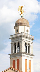 Golden Angel on the bell tower in UDINE city in Northern Italy