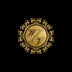 Luxury golden circle badge with W and V uppercase letter. Vector letter stamp for wedding, greeting cards, invitations design.