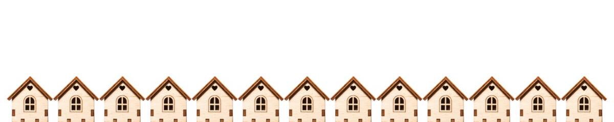 pattern of a small wooden house on a white background. the concept of quarantine at home. stay at home