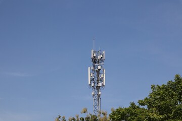Telecommunications antennas, radio and satellite communication technology, telecommunications industry Mobile network or telecommunications 4g 5g separated from the blue background