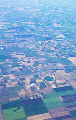 Fototapeta premium The view from the airplane window to the ground. Landscape view from the sky