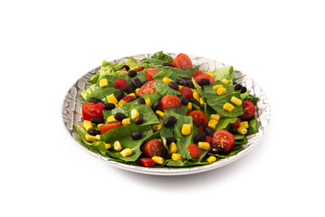 Mexican salad with black beans, corn,tomatoes,lettuce and pepper isolated on white background