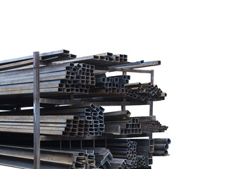 A pile of rectangular metal pipes on a rack in s storage. Pipe line, iron, tubes, building construction, metal works.