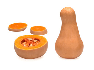 One whole and chopped mini pumpkin isolated on a white background