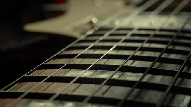 Guitar neck, extreme close up.Guitar Strings And Frets For Making Music
