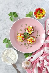 Canape or crostini with toasted bread, light cheese and colorful bell pepper. Top view with copy space.