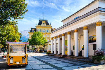 The post office (Post- und Telegrafen-Amt) and Trinkhalle from the imperial times of Austria in the town of Bad Ischl , Austria