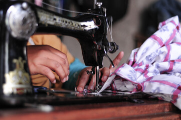 a tailor's hand
